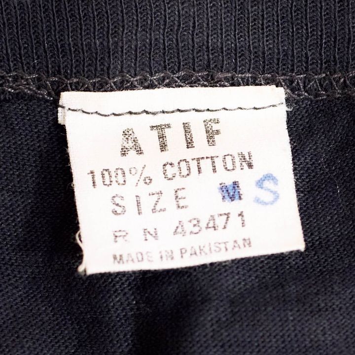 パキスタンメイドのTシャツタグ