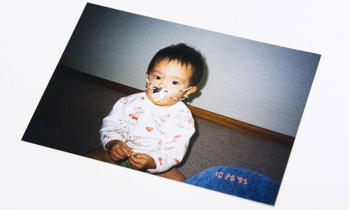 第2子の息子が小さかったとき、くわえていたおしゃぶりを落としてしまうことを不便に感じて福井さんが発明した「モーモーおしゃぶり」