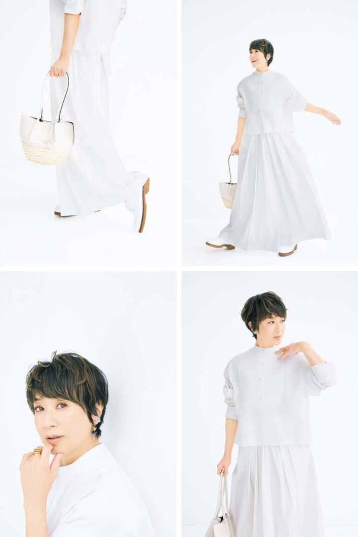 ブラウス¥151,800、パンツ¥242,000（参考価格）／ともにファビアナフィリッピ（アオイ）、左耳上部水色ピアス¥29,700、下部ピアス¥112,200、右耳ピアス¥75,900／すべてヒロタカ（ヒロタカ 表参道ヒルズ）、リング¥49,500／ヒロタカ（アバロン）、バッグ¥168,300／トッズ（トッズ·ジャパン）、靴¥171,600／ジェイエムウエストン（ジェイエムウエストン 青山店）