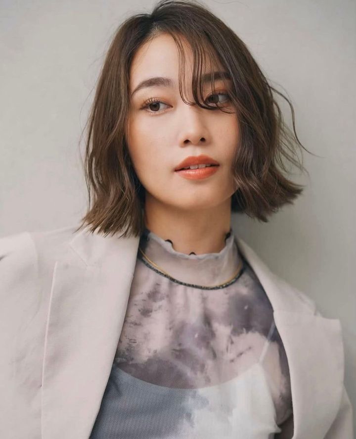 外ハネ+巻き髪スタイル