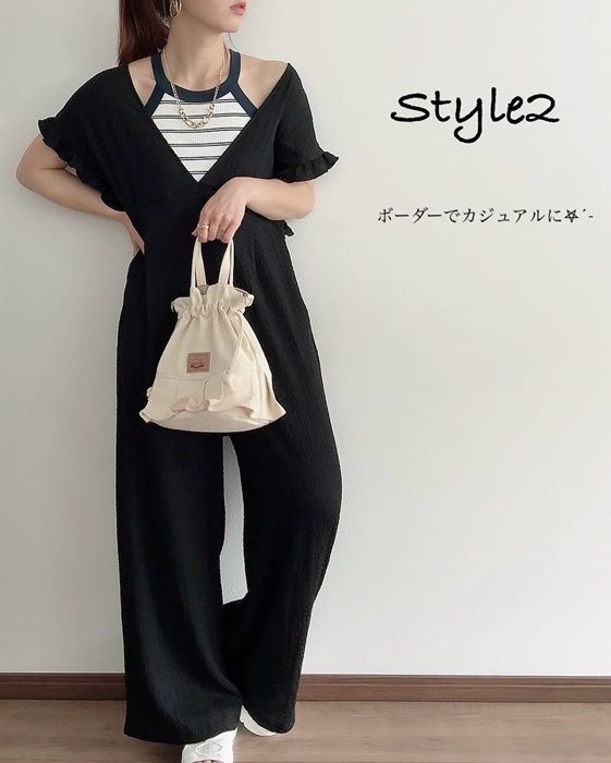 UNIQLOのホワイトの「ホルターネックブラタンクトップ」