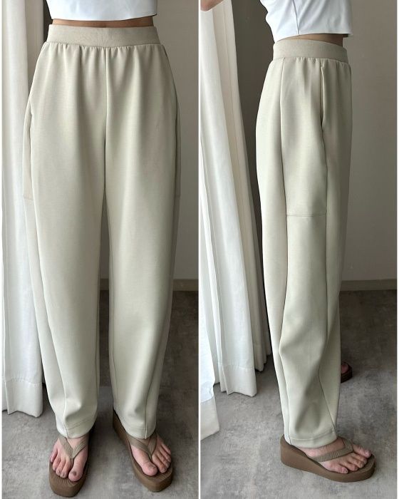 UNIQLOのナチュラルの「ドライスウェットカーブパンツ」