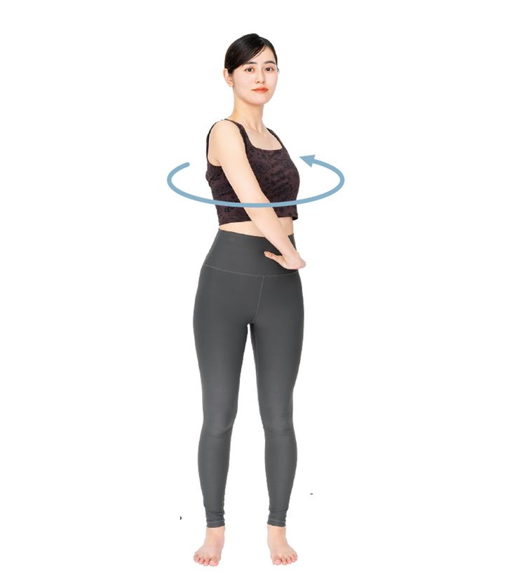 顔と骨盤は正面を向いたまま、腰に添えた手を滑らせるように上体をゆっくり捻る。