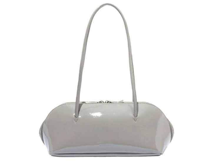 コスメポーチからヒントを得た曲線的なフォルムと、艶やかなグレーのエナメルが優美。[H15×W39×D13]￥19,800（アドカラム／アンソロジー） 