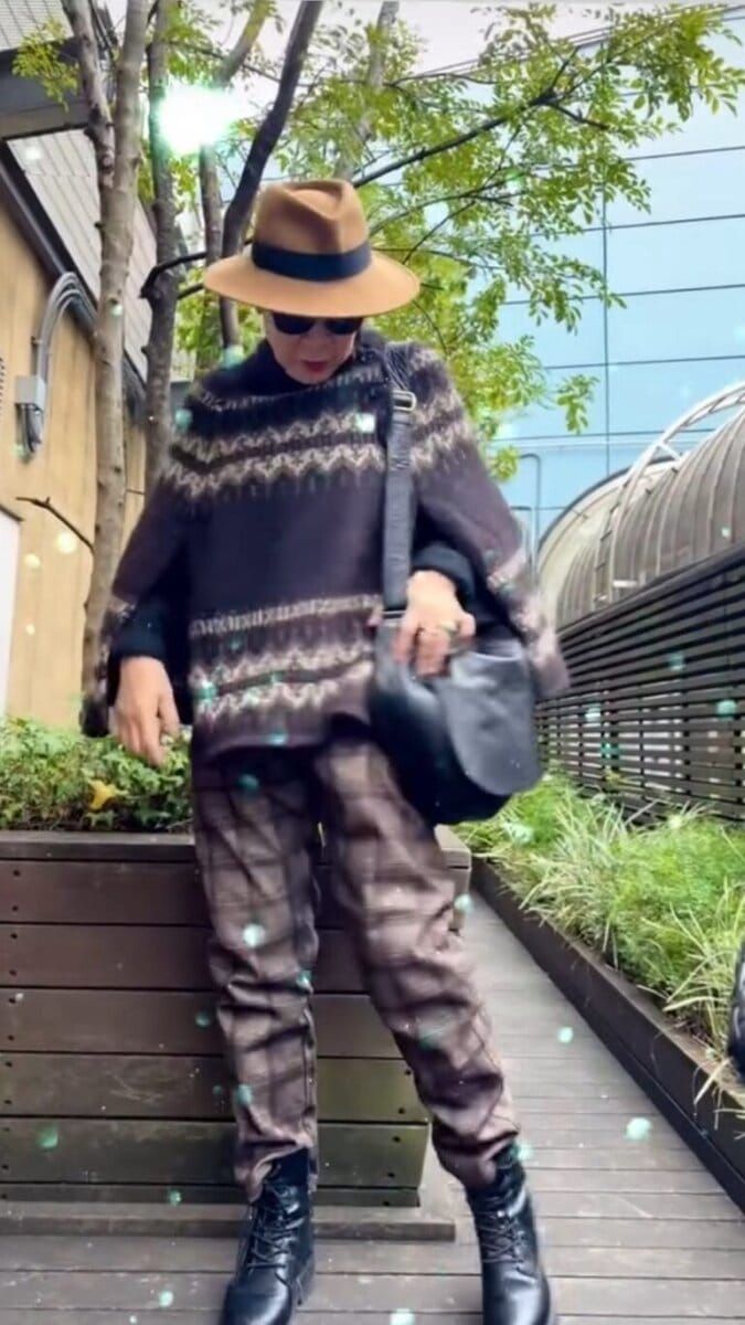 島崎真代さんのケープの着こなし