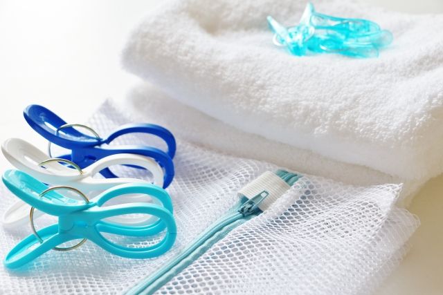 洗濯イメージ 洗濯ネットと洗濯バサミとタオル