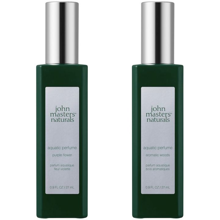 〈左から〉アクアパフューム（パープルフラワー） 27ml ￥5,280 アクアパフューム（アロマティックウッズ） 27ml ￥5,280（ともに11月13日より限定発売）