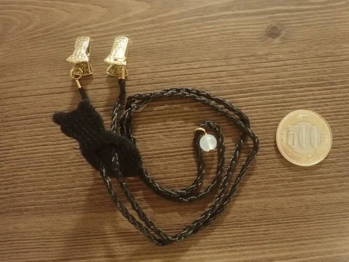 DAISO(ダイソー)：帽子クリップ(UVチェッカー付、猫)