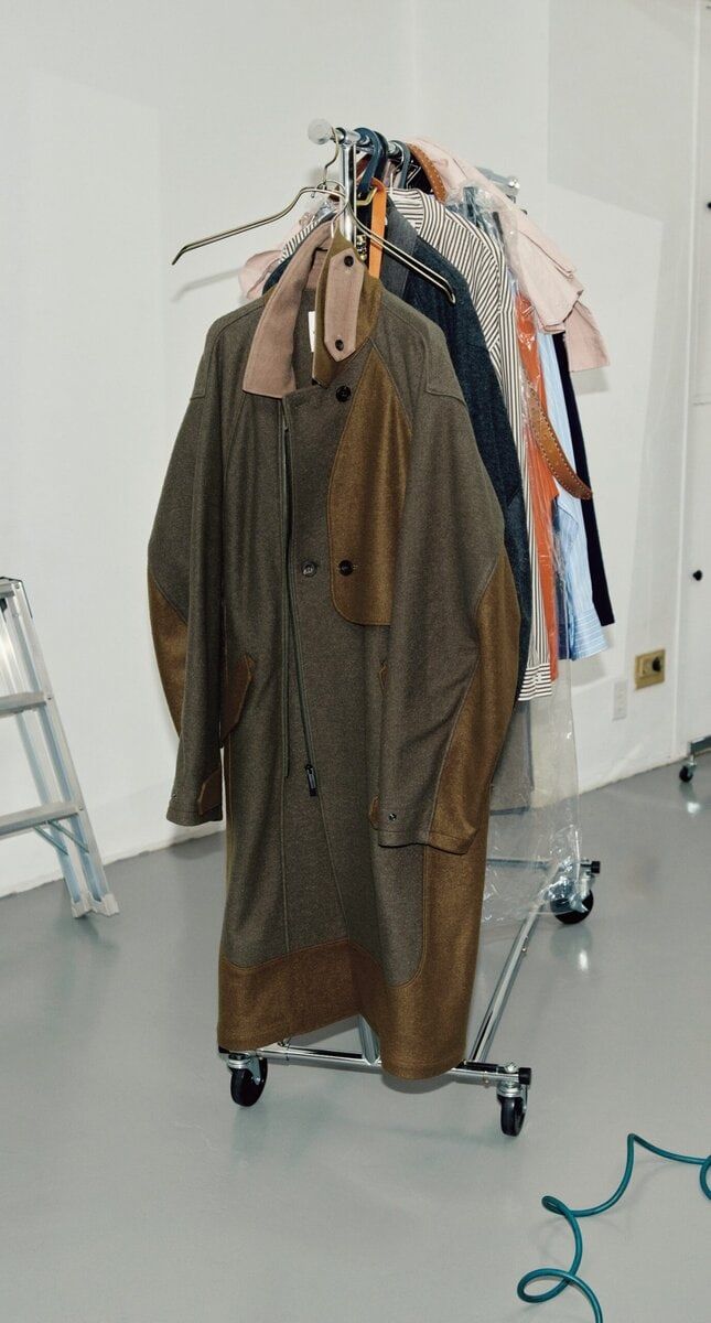 ホワイトマウンテニアリングのバルマカーンコート