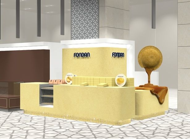 バターを連想させる黄色を基調とした店舗。お菓子のオブジェを配置し、シンプルな中にも遊び心をプラス