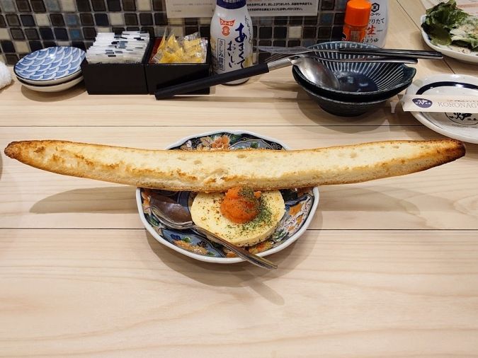 炉端とおでん呼炉凪来 天神店 料理明太カマンベールバゲット添え①