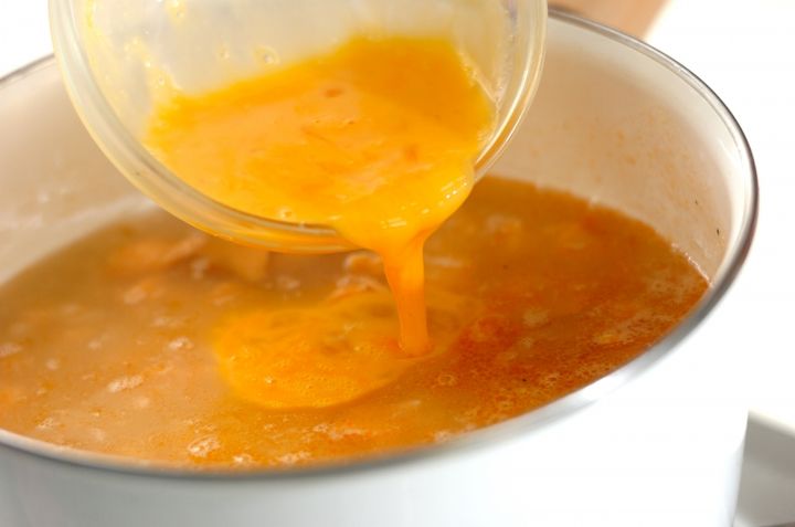 簡単で人気の雑炊 塩鮭と梅 ほっこり胃に優しい by金丸 利恵の作り方2