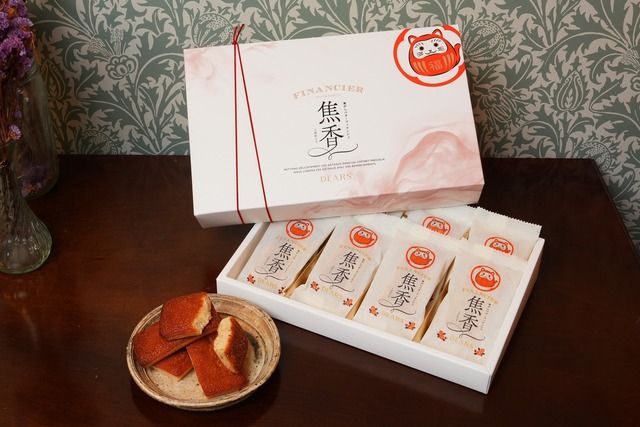 パッケージや箱には、だるまをイメージしたねこがデザインされています