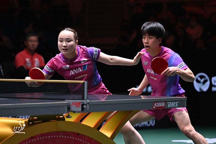 伊藤美誠、篠塚大登（C）ITTF