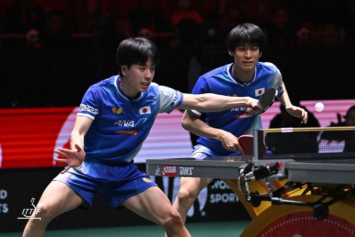 篠塚大登、戸上隼輔（C）ITTF