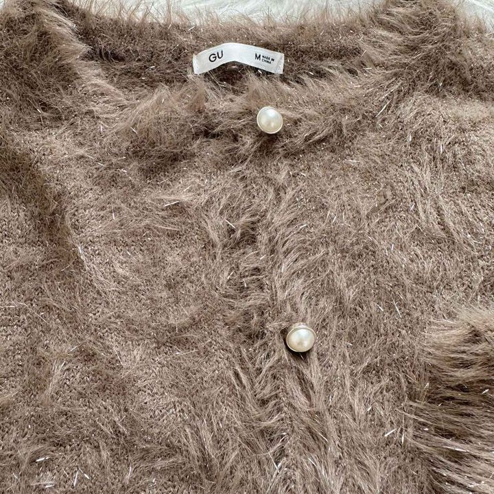 画像: パール調ボタンがさりげなく上品