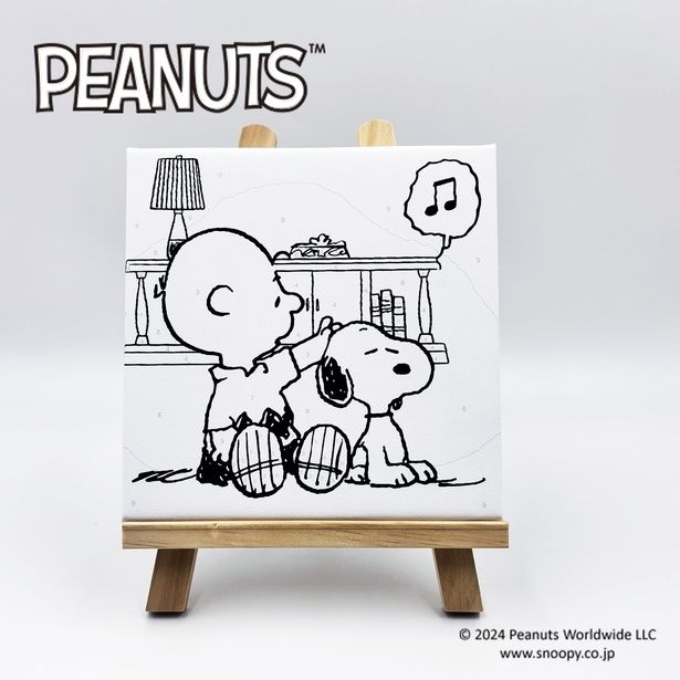 イーゼルに飾った小サイズ作品。モノクロの線画に色を加えていく楽しさ