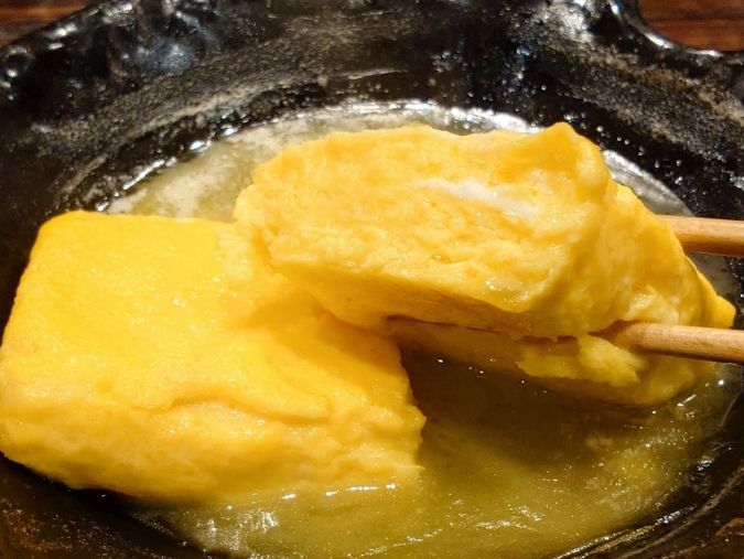 大衆炉端 こめろまん。博多駅総本店 鶏白湯だし巻き➁