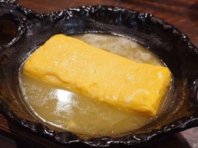 大衆炉端 こめろまん。博多駅総本店 鶏白湯だし巻き①