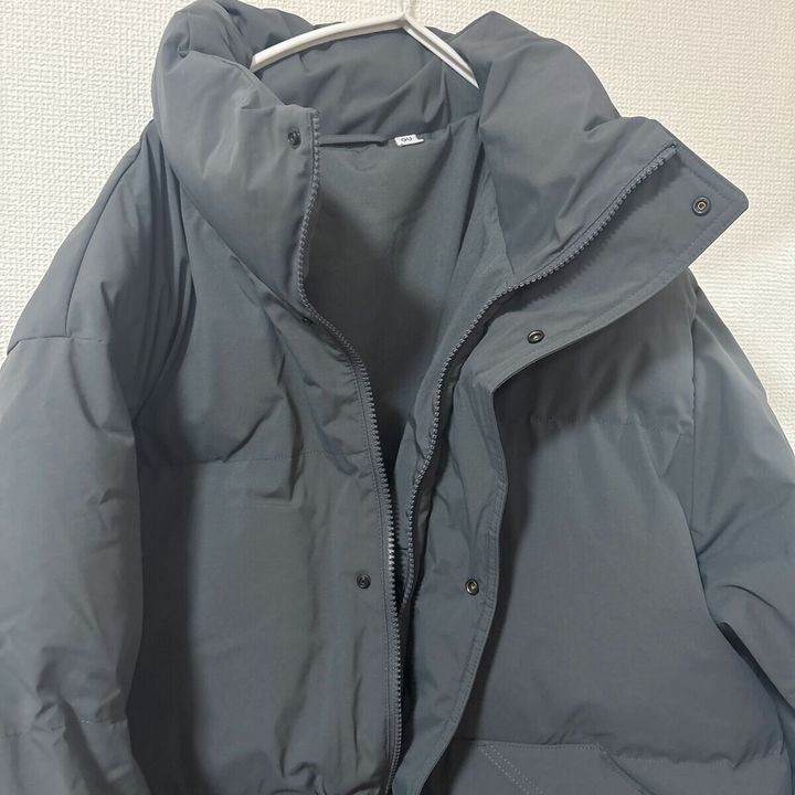 GUウォームパデッドスタンドブルゾンのファスナー部分