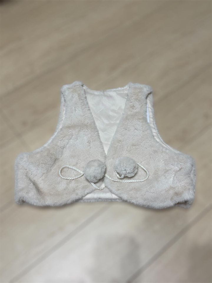 画像: フワフワベスト