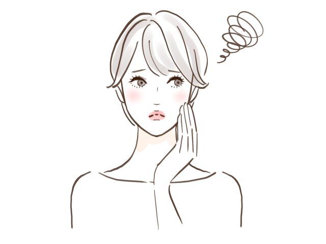 困った顔の女性