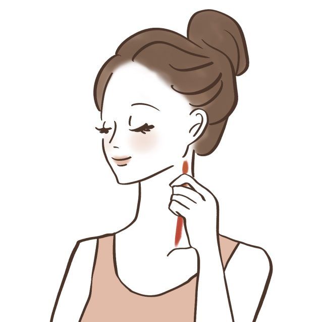 首をマッサージする女性