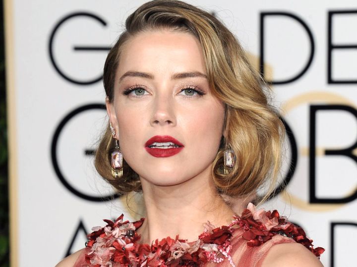 アンバー・ハード、ジョニー・デップとの泥沼裁判で「話す力を失った」と語る （C）AFLO width=