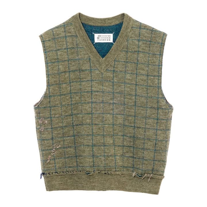 シグネチャーの4本の白いステッチ入り。（メゾン マルジェラ／マルジェラ ジャパン クライアントサービス）