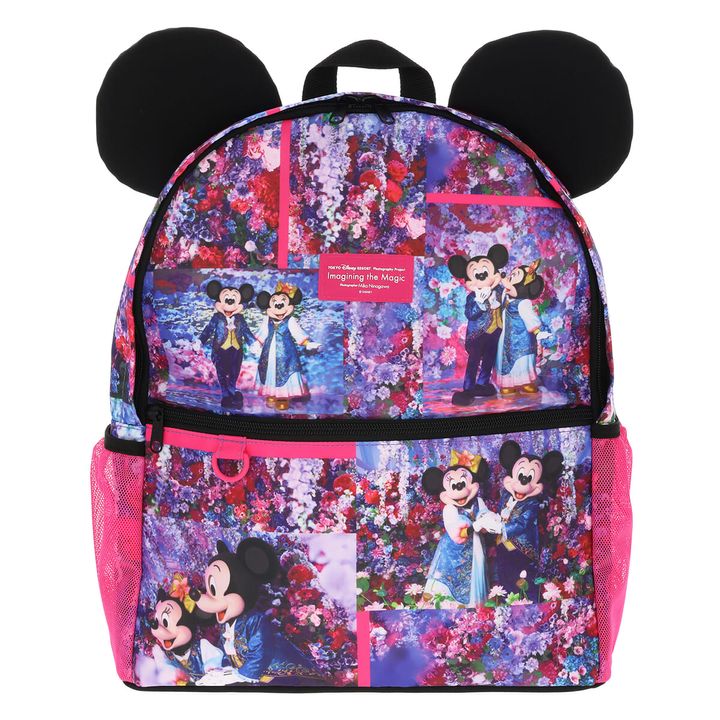 黒いミッキーマウスの耳がトップに付いた、蜷川実花のアートが全面にプリントされたリュックサック正面