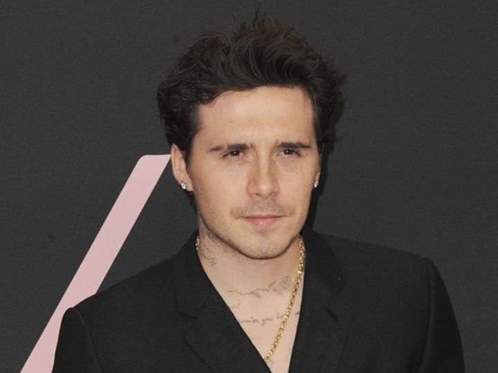 ベッカム長男、父に続き兄弟へのタトゥーも上書き （C）AFLO width=