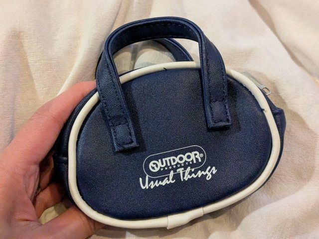 バッグ形ポーチ正面 OUTDOOR PRODUCTS Usual Things ロゴプリント（ネイビー×ホワイトパイピング、持ち手付き）