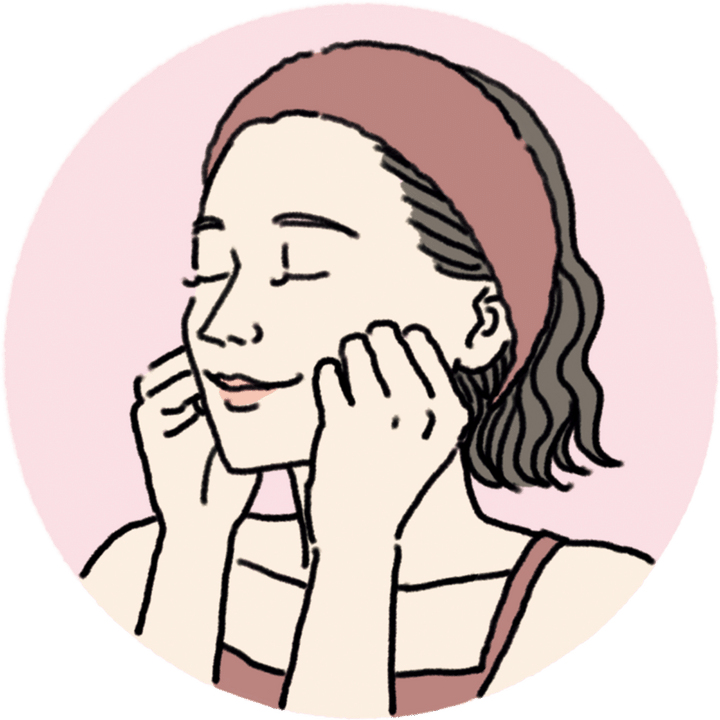 げんこつを作って第二関節を頬骨の下に当て、筋肉を左右に揺らして緩める。