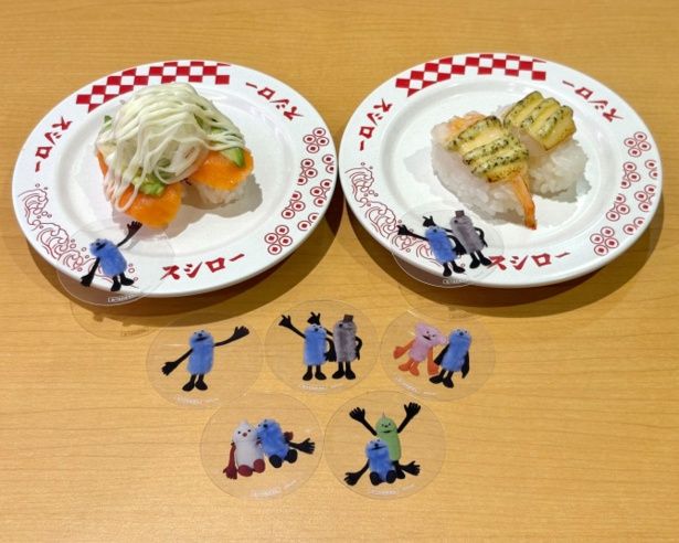 パペットスンスンコラボ限定クリアピック付き サーモンアボカド(左：250円～)とパペットスンスンコラボ限定クリアピック付き えびと蒸し帆立のバジルマヨチーズ炙り(右：250円～)