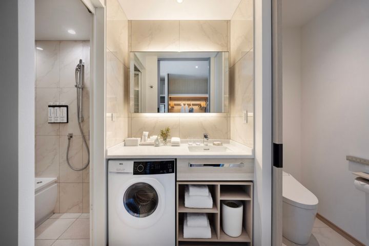 全客室には洗濯乾燥機が備えられている。