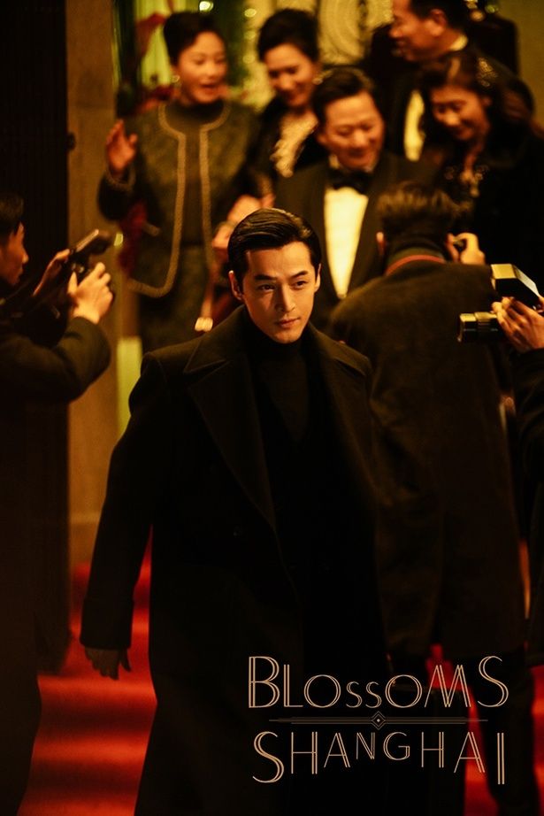 普通の青年から社長へと成り上がる阿宝 [C]2023 BLOSSOMS ISLAND PICTURES LTD. ALL RIGHTS RESERVED