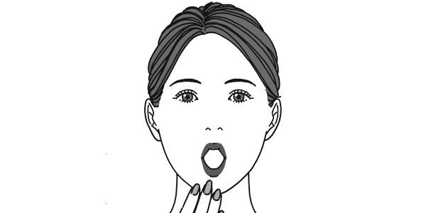 あごに力が入る人は、あごを手で押さえる