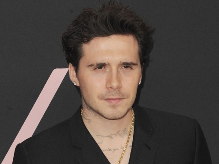 ブルックリン・ベッカム、不仲の家族への皮肉を込めたタトゥーを入れる （C）AFLO width=