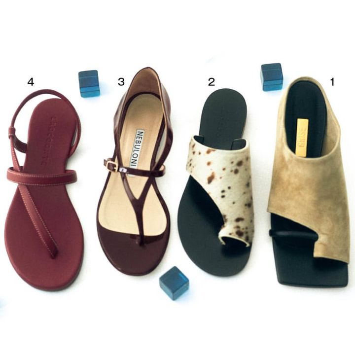 1. ベージュのスエードと指をホールドする黒のストラップの大胆なコントラストがスタイリッシュ。甲を覆うデザインでヒールがあっても安定感抜群。サンダル［Ｈ5］¥19,800(ル タロン グリーズ／ル タロン グリーズ ルミネ新宿店) 2. 親指から甲にかけてすっぽりカバーするモダンなバランス。柔らかなカーフ素材で足なじみも最高。サンダル［Ｈ1.5］¥33,000(ラオコンテ) 3. パテントのブラウンが艶やか。交差する華奢なストラップが足元を女性らしく引き立てる。かかとをしっかりサポートしてくれるので歩きやすい。靴［Ｈ1］¥69,300(ネブローニ) 4. 2本のストラップで支えるプリミティブなミニマルさが新鮮。ヌーディでリゾートライクな足元に。サンダル［H0.5］¥25,300(ラオコンテ／デ・プレ)