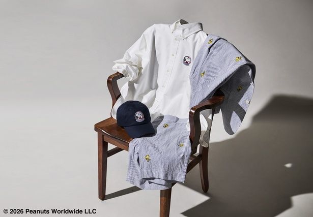 シアサッカーのジャケットとショーツにボタンダウンシャツ、キャップを合わせた、夏のプレッピースタイル