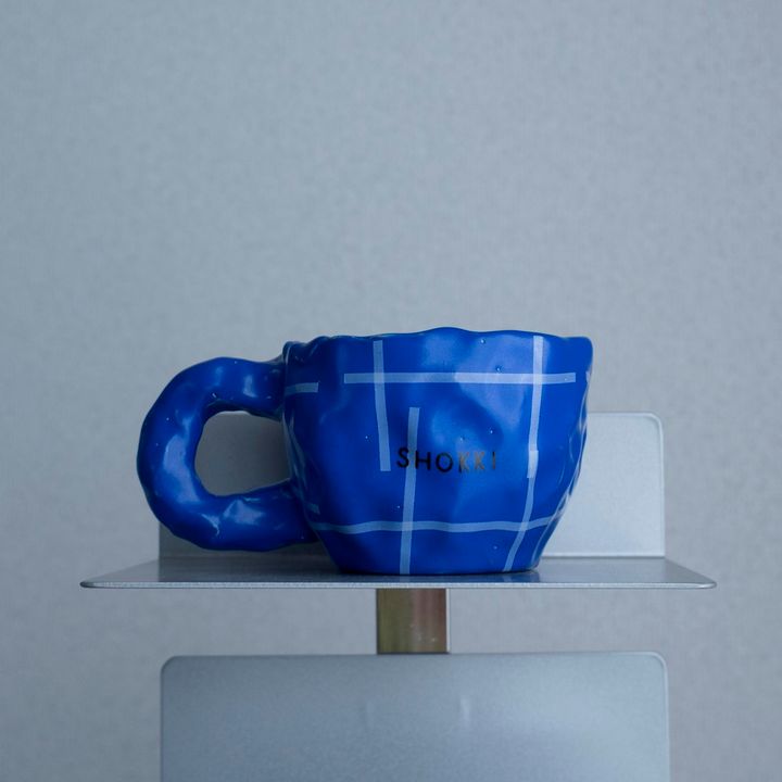 〈SHOKKI〉のマグカップ