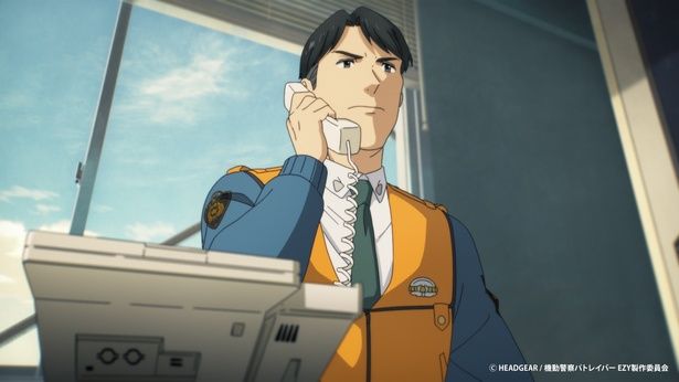 間昭彦(はざま・あきひろ)。昭和的なダジャレ好きという一面も… [c]HEADGEAR / 機動警察パトレイバー EZY製作委員会