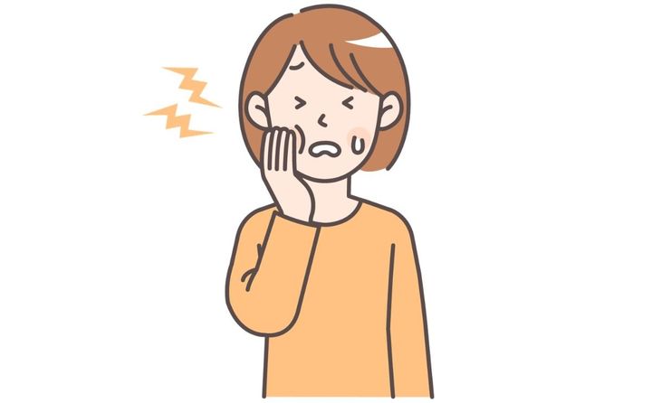 口の中が痛い人 口を抑える人のイラスト