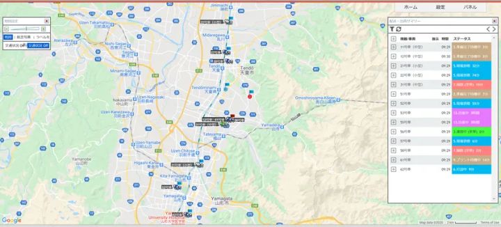 スマートアジテーター管理システムの車両位置情報マップ画面。山形県天童市・山形市周辺の地図上に複数の生コン車両アイコンが表示され、右側パネルには車両番号・出発時刻・ステータス（配送中・完了等）が一覧表示されている