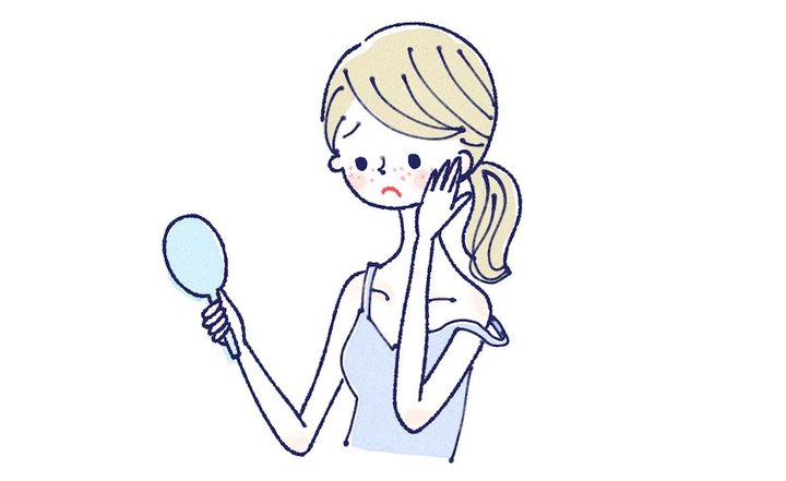 鏡を見る肌で悩んでいる女性のイラスト