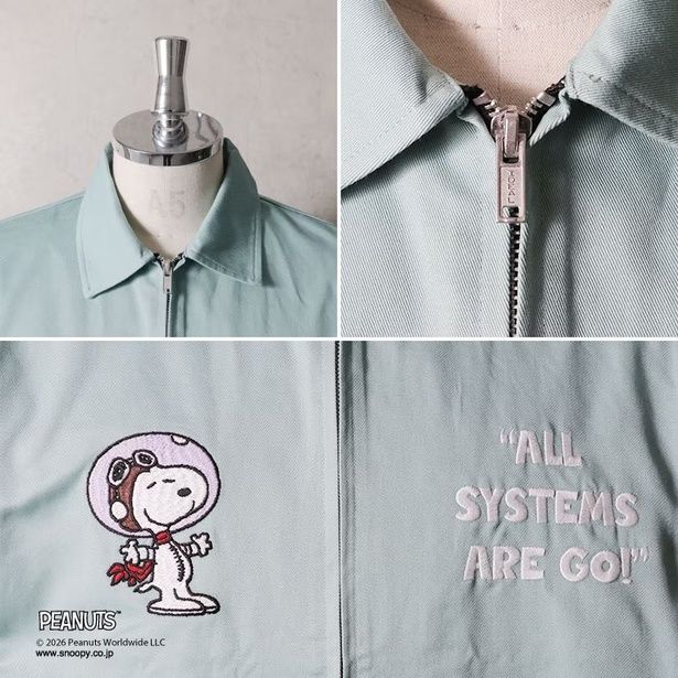 襟元のクリーンなシルエットと、IDEAL社製のヴィンテージライクなジップ、ヘルメットを被ったスヌーピー＆「ALL SYSTEMS ARE GO!」の刺しゅう