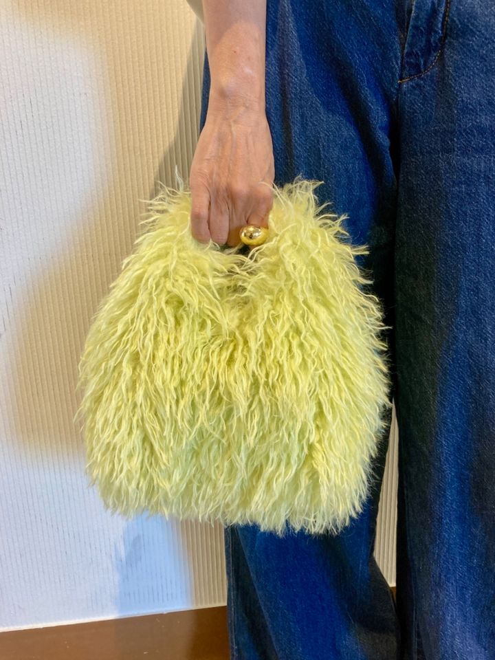 バッグは「KEITA MARUYAMA」
