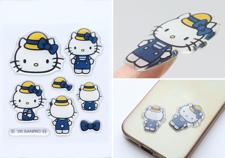 ぷっくりシールを指でつまんだりスマホに貼っている様子