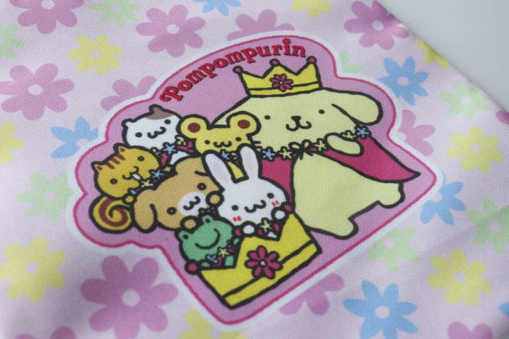 ポムポムプリンと仲間たちが王様姿で描かれた巾着のイラスト部分