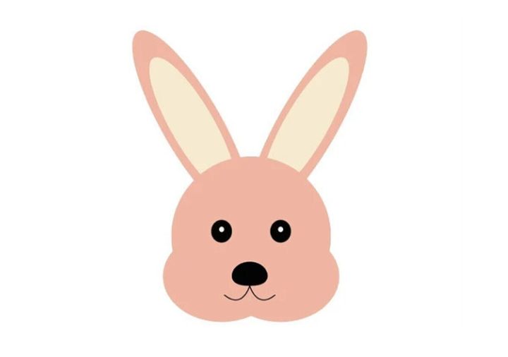 長い耳を立てたピンク色のうさぎの顔のイラスト